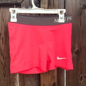 Bright pink nike pro spandex